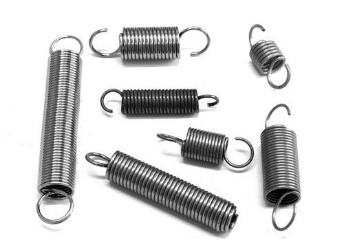 Which one of the following springs resists a tensile load applied by means of a suitable end form, hook or loop ?
